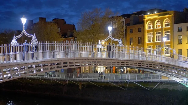 stock image Famous Ha Penny Bridge in Dublin by night - travel photography - Ireland travel photography