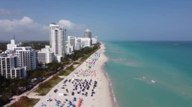 Flight over Miami Beach on a sunny day - aerial view