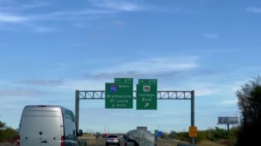 Direction signs on the highway to I-55 Blytheville and St Louis - POV driving by - MEMPHIS, USA - NOVEMBER 06, 2022