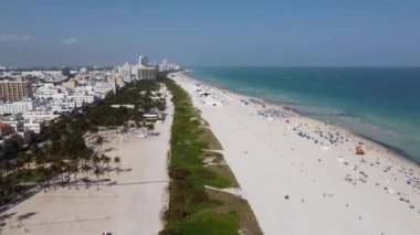 White sandy beaches of Miami Beach on a sunny day - aerial view