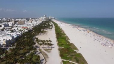 Flight over Miami Beach on a sunny day - aerial view