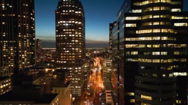Jersey City at night with its office buildings - aerial view - NEW YORK, UNITED STATES - FEBRUARY 15, 2023