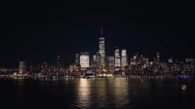 Aerial view over the skyline of Manhattan New York City at night - drone photography