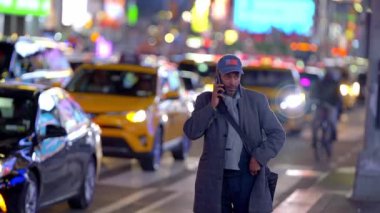 Afro-American Man in the streets of New York at Times Square - travel photography