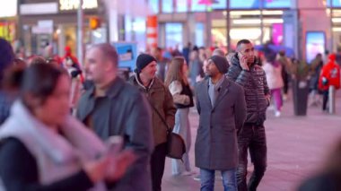 Times Square Manhattan is a popular place at night - NEW YORK CITY, UNITED STATES - FEBRUARY 14, 2023