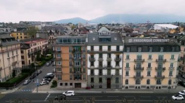 Cenevre şehrindeki büyük markalar - GENEVA, SWitzERLAND EUROPE - 19 Nisan 2023