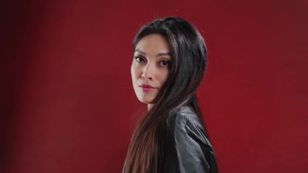 Young Asian Woman Leather Jacket Poses Camera Extreme Slow Motion — Video