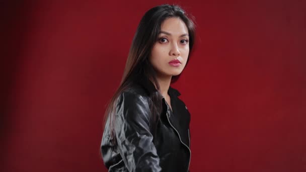 Young Asian Woman Wearing Leather Jacket Studio Photoshooting Extreme Slow — Stockvideo