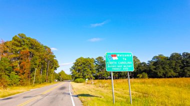 Driving to North Carolina - NC Welcome sign - travel photography clipart