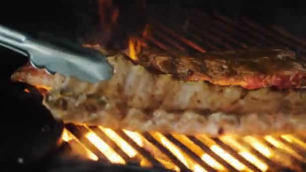 Grilled Meat Juicy Pork Ribs Grilled Blazing Fire Lying Black — Stock Video