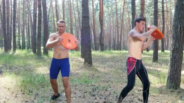 Young Athletic Men Bare Naked Torsos Perform Strength Exercises Heavy — Stock Video