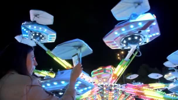 Woman Hands Holding Smartphone Taking Photo Shooting Video Carousel Lights — Stock Video