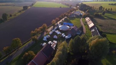 panorama orbit drone brandenburg circus tent in kremmen Oberhavel at golden houre 2022. 4k marnitz Cinematic