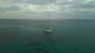 wide orbit overview drone beach formentera island ibiza spain, fall 2022. High Quality 4k Cinematic footage