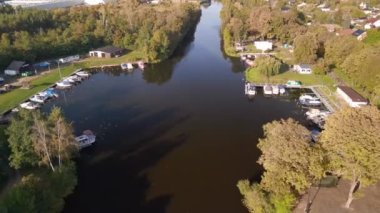 panorama orbit drone river, Brieselang in brandenburg Germany at summer golden hour 2022. High Quality 4k Cinematic footage