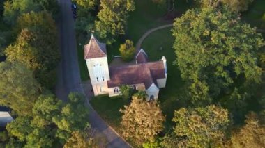 drone top down view of Village church in Paretz Brandenburg Havelland Germany summer evening 2022. High Quality 4k Cinematic footage