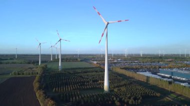 panorama overview drone of a Wind farm wheel Field at Brandenburg Germany at autumn day 2022. High Quality 4k Cinematic footage