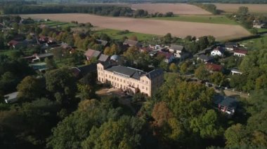 panorama overview drone of village ziethen castle in brandenburg germany, sunny summer day 2022. High Quality 4k Cinematic footage