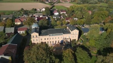 panorama orbit drone of village ziethen castle in brandenburg germany, sunny summer day 2022. High Quality 4k Cinematic footage