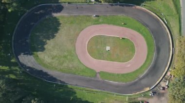 vertical birds eye view drone ace track oval course germany, sunny summer day 2022. High Quality 4k Cinematic footage.