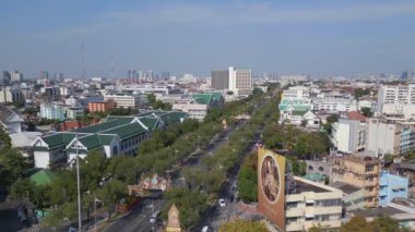 fly reverse drone Bangkok street road thailand, sunny day 2022. High Quality 4k Cinematic footage. 