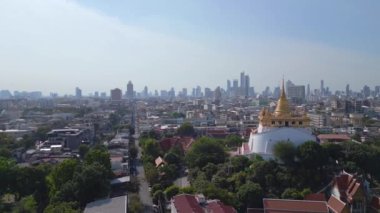 panorama overview drone Bangkok Tempel thailand Wat Saket Golden Mount, sunny day 2022. High Quality 4k Cinematic footage. 