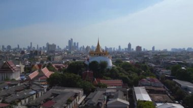 panorama overview drone Bangkok Tempel thailand Wat Saket Golden Mount, sunny day 2022. High Quality 4k Cinematic footage. 