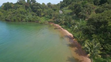 descending drone natural Beach at Koh chang island Thailand sunny day 2022. High Quality 4k Cinematic footage.