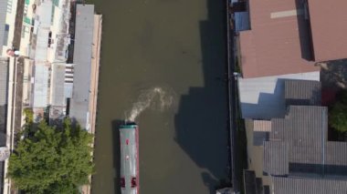 vertical birds eye view drone Bangkok river road bridge thailand, sunny day 2022. High Quality 4k Cinematic footage. 