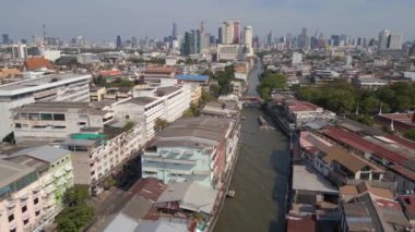 fly reverse drone Bangkok river road bridge thailand, sunny day 2022. High Quality 4k Cinematic footage. 