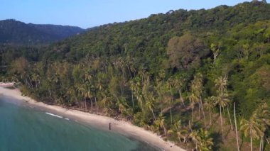 boom sliding to left drone koh kood island Thailand sunny day 2022. High Quality 4k Cinematic footage.