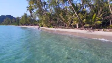 wide orbit overview drone koh kood island Thailand sunny day 2022. High Quality 4k Cinematic footage.