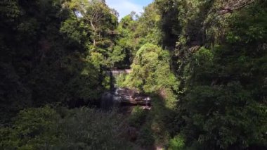 ascending drone of Huang Nam Khiao Waterfall deep in the jungle on island ko kut thailand 2022. High Quality 4k Cinematic footage.