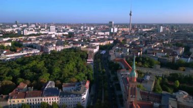 Serene jewish cemetery nestled within the bustling city of berlin, showcasing a tranquil oasis amidst the urban sprawl. speed ramp hyper motion time lapse 