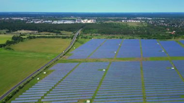 Aerial view of a large solar farm in Germany, providing clean and sustainable energy. panorama overview drone 