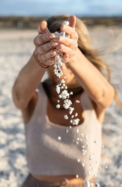 Popcorn Beach Defocused Blonde Woman Throwing Hands Pebbles Beach Fuerteventura — Stock Photo, Image
