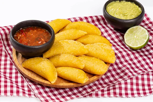 Colombian Empanada With Spicy Sauce And Guacamole On White Background.