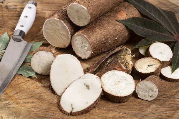 stock image Fresh Organic Cassava Root - Manioc Esculenta; On Wooden Background