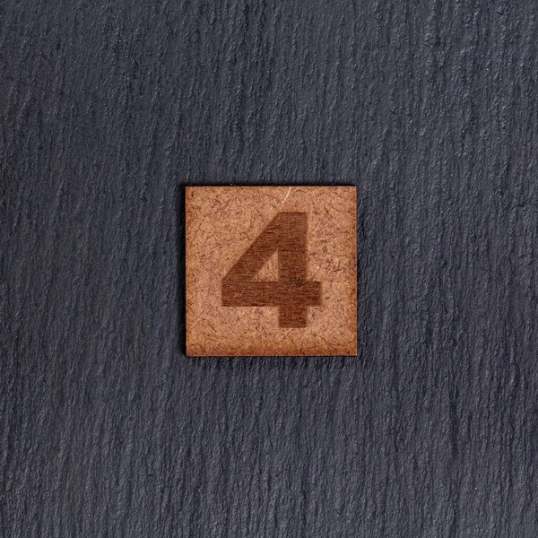 Número Azulejos Quadrados Madeira Número Fundo Pedra Preta — Fotografia de Stock