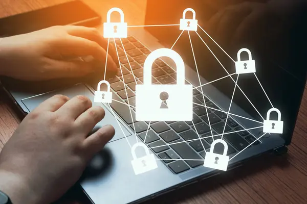 Woman hands typing on laptop with warm light and lock protection interface. Internet security and data protection concept. Blockchain and cybersecurity.