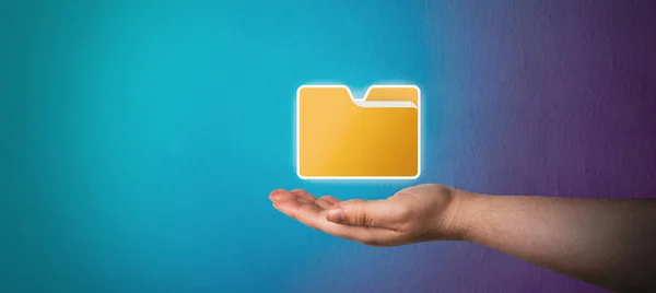 Banner of woman hand showing yellow folder icon with dark blue background. Manage Document System Storage concept. Database technology. File access. Online documentation software.