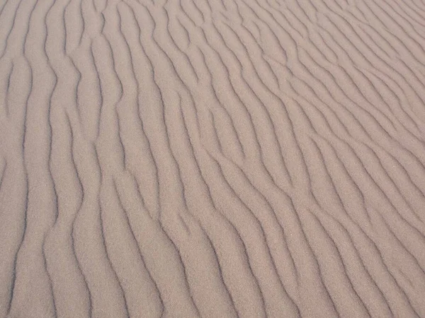 Feche Textura Areia Com Marcas Ondulação Foto Alta Qualidade — Fotografia de Stock