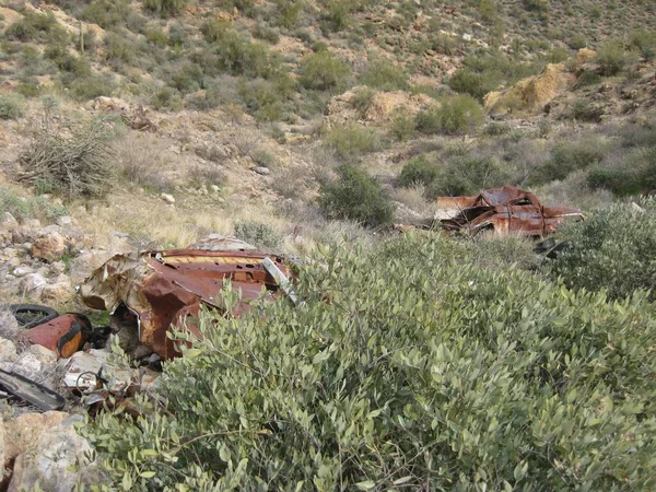 stock image Rusty Old Abandoned Cars in Arizona Ravine near Phoenix. High quality photo