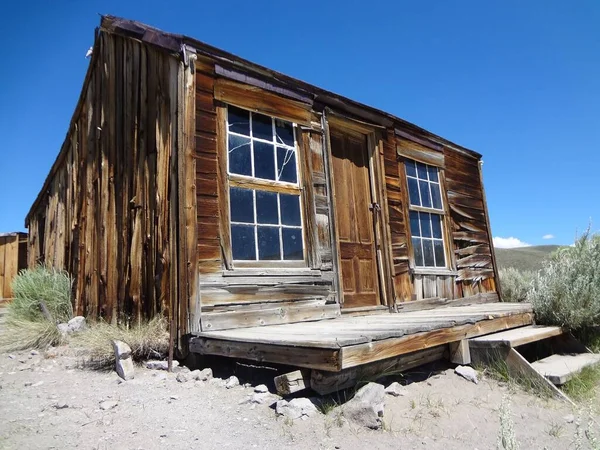 Bodie Ghost Town, California - Old Wooden Miners Cabin with Porch . High quality photo
