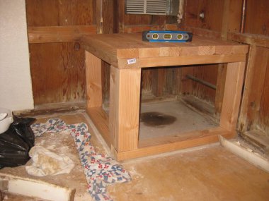 Level on Newly Built Wooden Water Heater Stand Frame . High quality photo