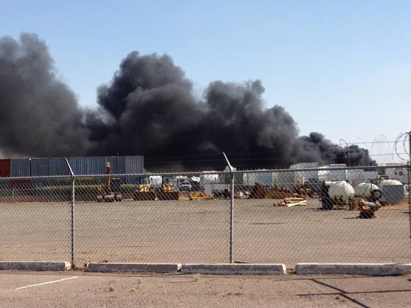 Lots of Black Smoke from Industrial Fire in Phoenix, Arizona . High quality photo