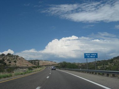 Rest Area Blue Sign on Interstate Driving on Road Trip . High quality photo