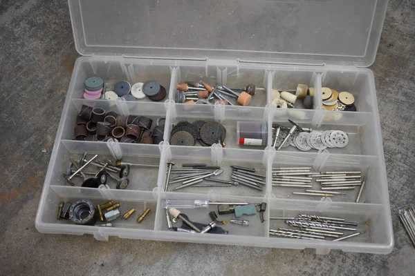 Organized Plastic Box with Dividers Full of Rotary Bits . High quality photo