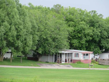 Summer in Southeastern Wisconsin, Trailer Park with Big Trees. High quality photo clipart