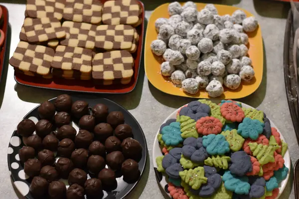 stock image Four Batches of Assorted Real Homemade Christmas Cookies. High quality photo